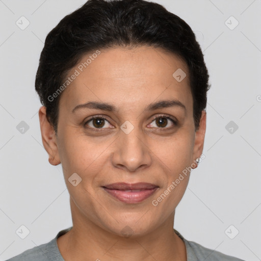 Joyful white adult female with short  brown hair and brown eyes