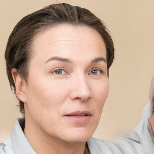 Neutral white adult female with short  brown hair and brown eyes