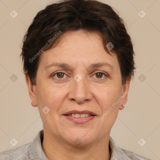 Joyful white adult female with short  brown hair and brown eyes