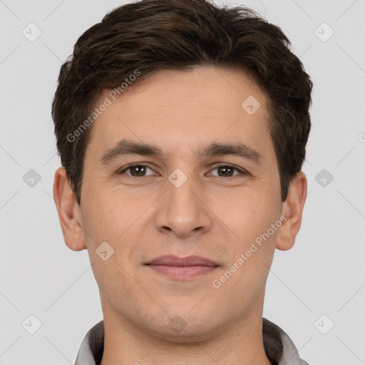 Joyful white young-adult male with short  brown hair and brown eyes