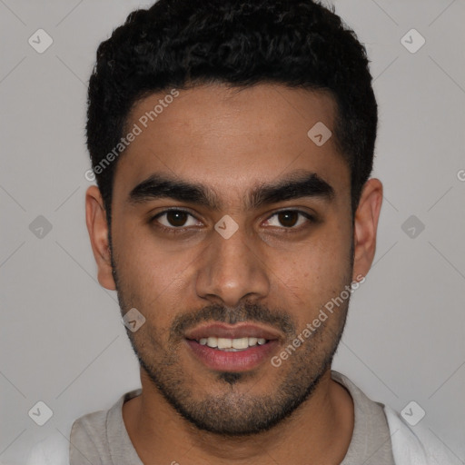 Joyful latino young-adult male with short  black hair and brown eyes