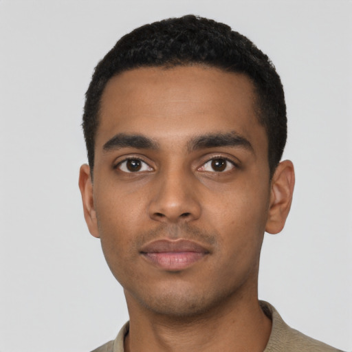 Neutral black young-adult male with short  black hair and brown eyes