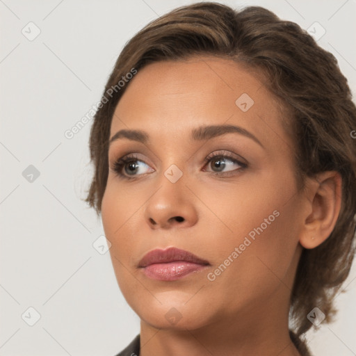 Neutral white young-adult female with medium  brown hair and brown eyes