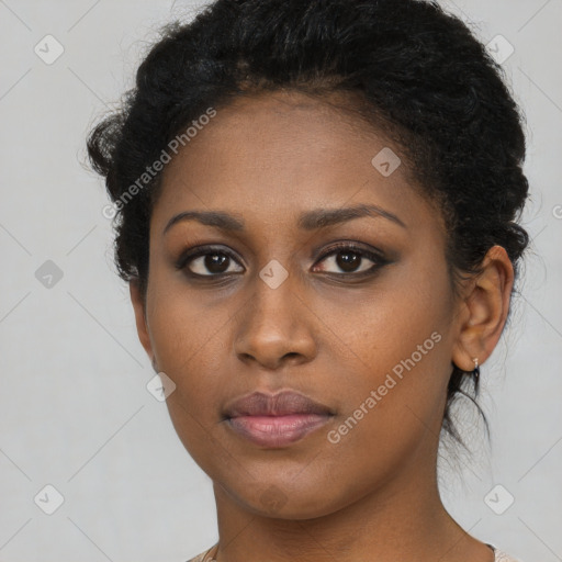 Neutral black young-adult female with short  brown hair and brown eyes