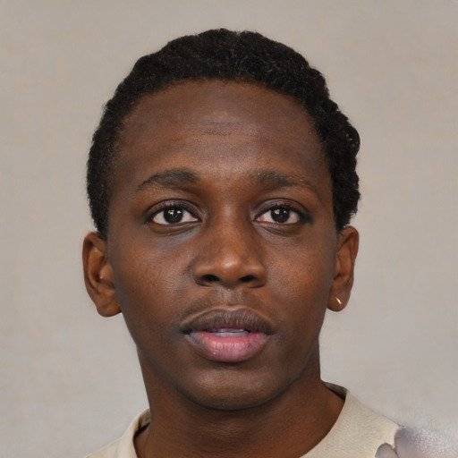Neutral black young-adult male with short  black hair and brown eyes