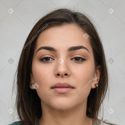Neutral white young-adult female with medium  brown hair and brown eyes