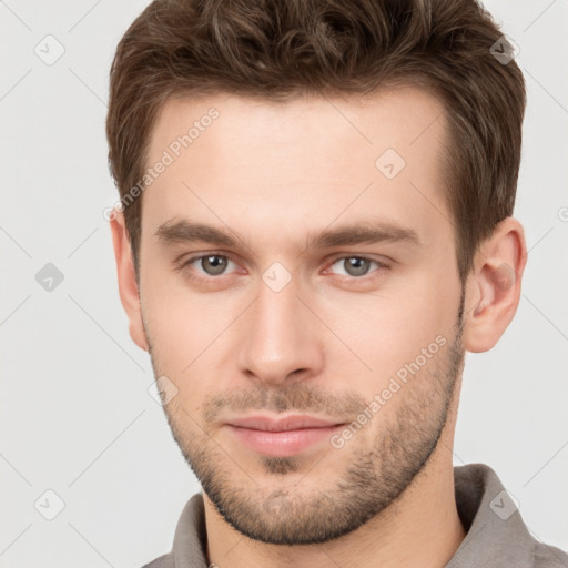 Neutral white young-adult male with short  brown hair and brown eyes