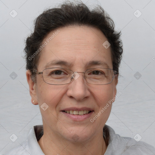 Joyful white adult female with short  brown hair and brown eyes