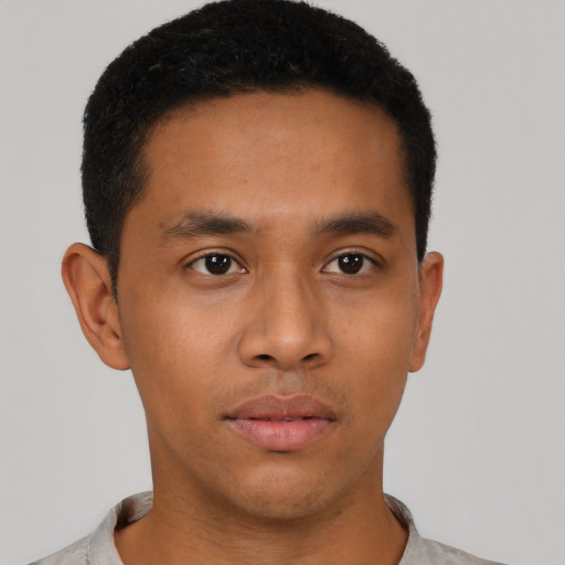 Neutral latino young-adult male with short  brown hair and brown eyes