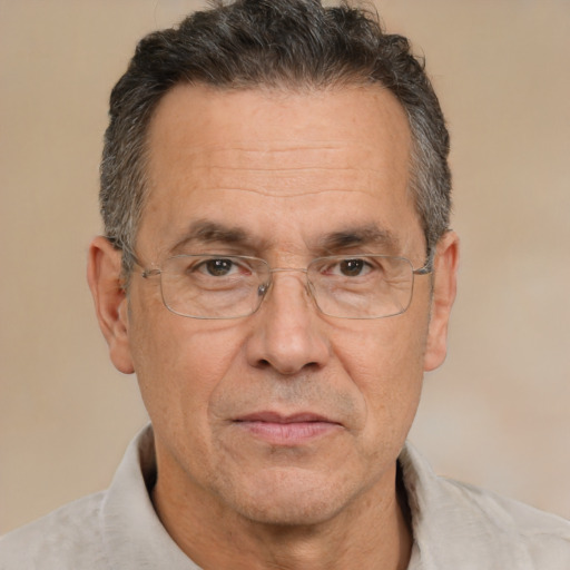 Joyful white middle-aged male with short  brown hair and brown eyes