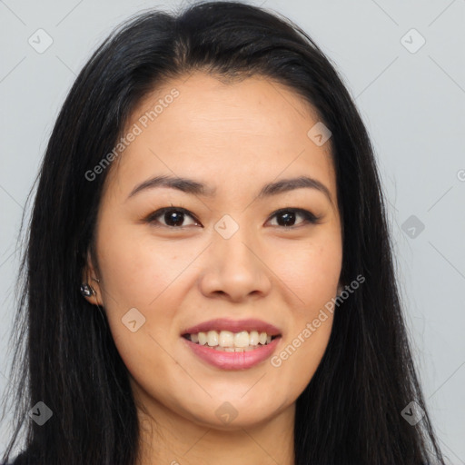 Joyful asian young-adult female with long  brown hair and brown eyes