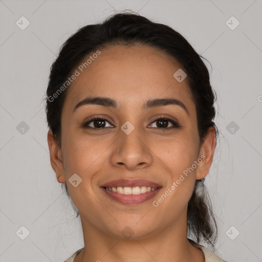 Joyful latino young-adult female with medium  brown hair and brown eyes