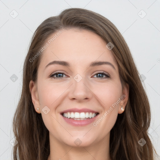 Joyful white young-adult female with long  brown hair and grey eyes