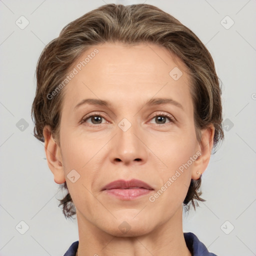 Joyful white adult female with short  brown hair and brown eyes