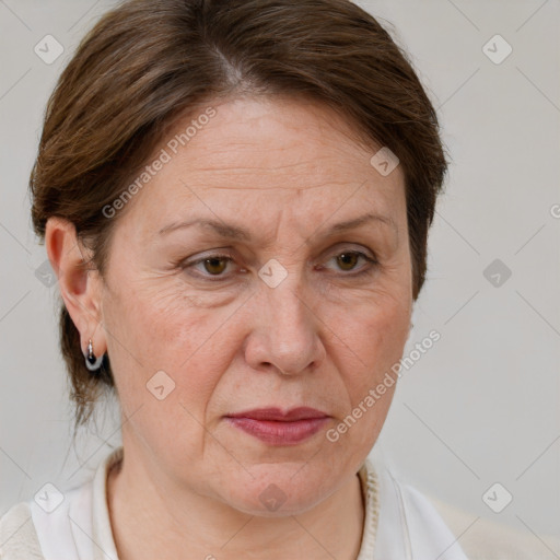 Joyful white middle-aged female with short  brown hair and brown eyes