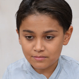 Joyful white child female with short  brown hair and brown eyes