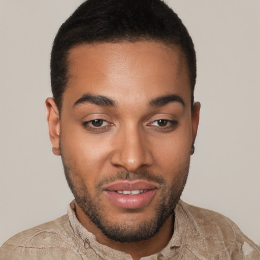 Joyful latino young-adult male with short  black hair and brown eyes