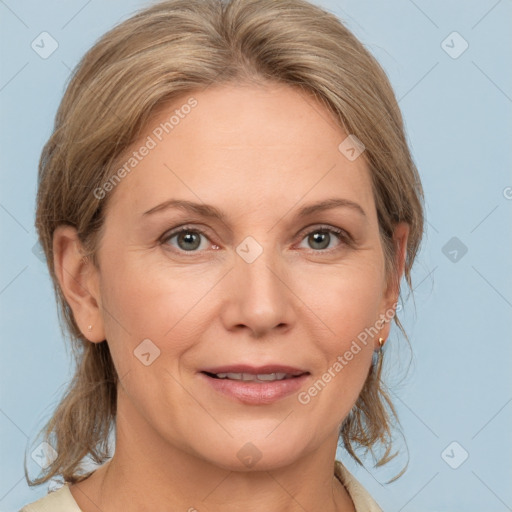 Joyful white adult female with medium  brown hair and grey eyes