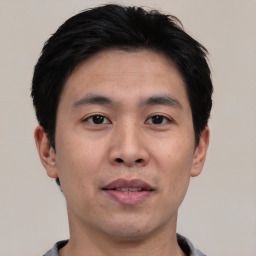 Neutral asian young-adult male with short  black hair and brown eyes