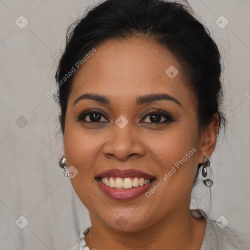 Joyful latino young-adult female with medium  brown hair and brown eyes