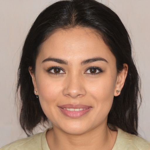 Joyful white young-adult female with medium  brown hair and brown eyes