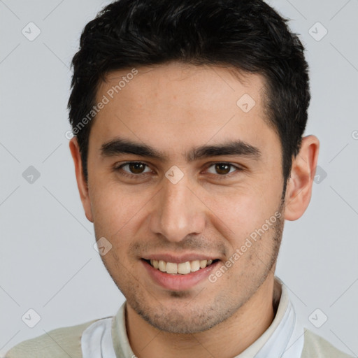 Joyful white young-adult male with short  brown hair and brown eyes