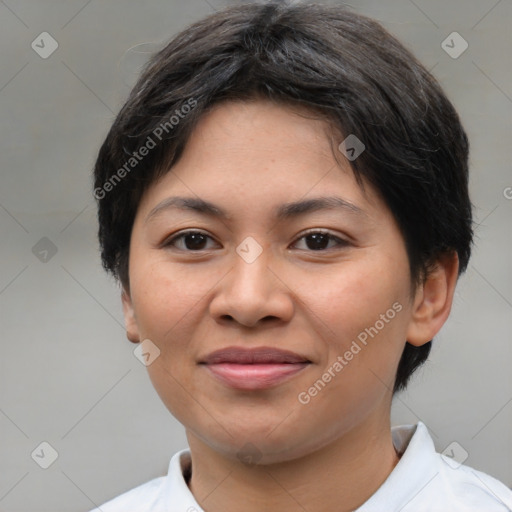 Joyful asian young-adult female with short  brown hair and brown eyes