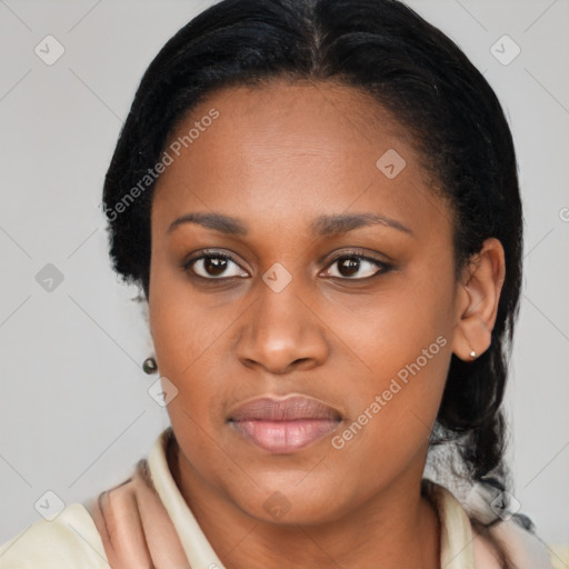 Joyful black young-adult female with medium  brown hair and brown eyes