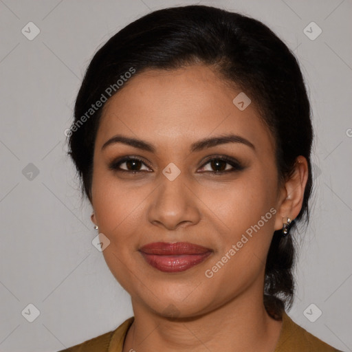 Joyful latino young-adult female with medium  brown hair and brown eyes