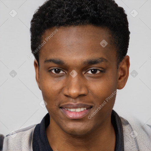 Joyful black young-adult male with short  brown hair and brown eyes