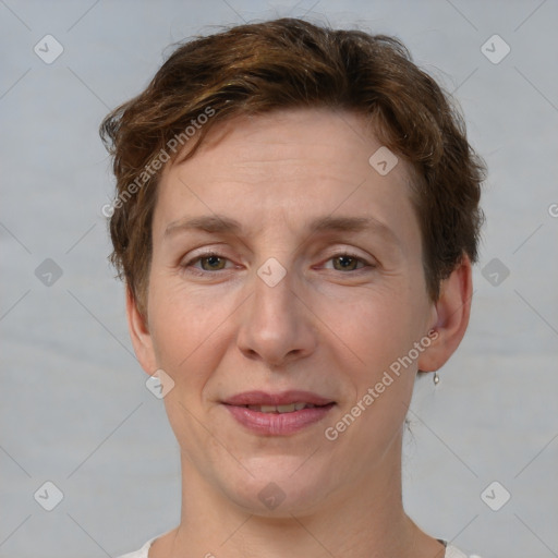 Joyful white adult female with short  brown hair and brown eyes