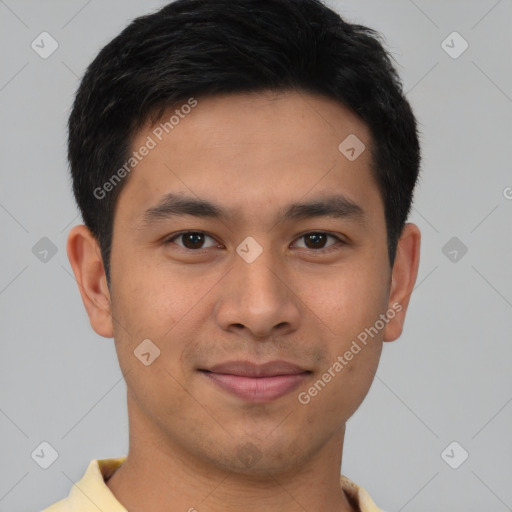 Joyful asian young-adult male with short  brown hair and brown eyes