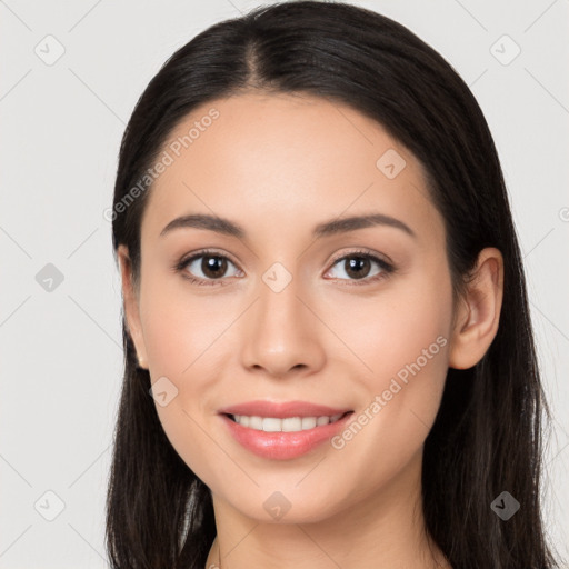 Joyful white young-adult female with long  black hair and brown eyes