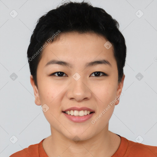 Joyful asian young-adult female with short  black hair and brown eyes