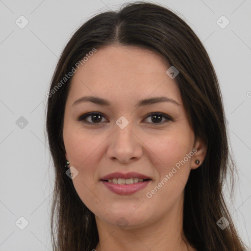 Joyful latino young-adult female with long  brown hair and brown eyes