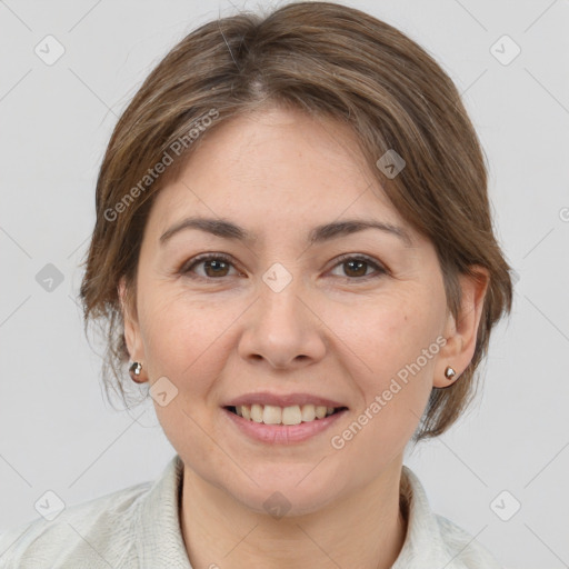 Joyful white adult female with medium  brown hair and brown eyes