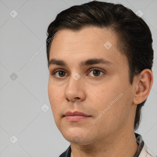 Neutral white young-adult male with short  brown hair and brown eyes