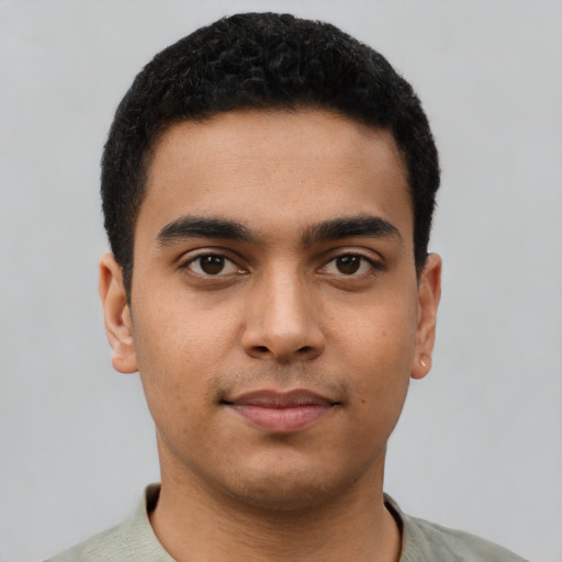 Neutral latino young-adult male with short  brown hair and brown eyes