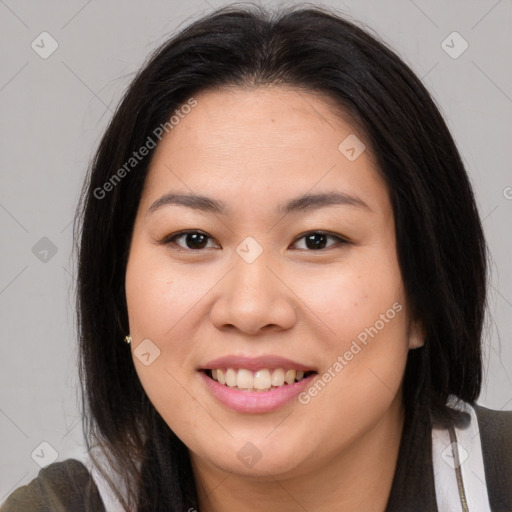 Joyful asian young-adult female with long  brown hair and brown eyes