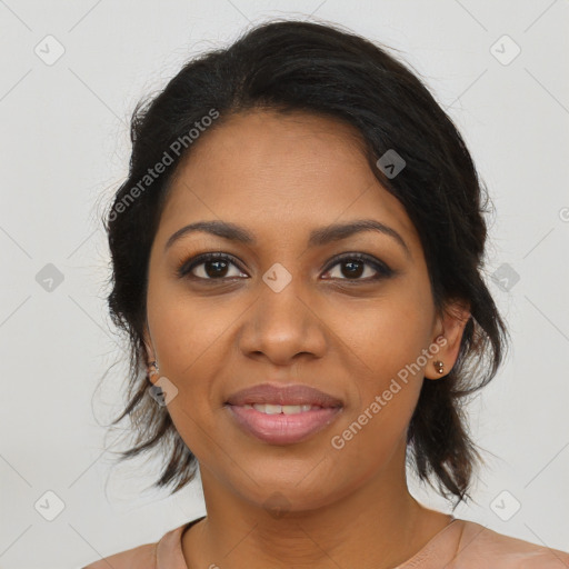 Joyful black young-adult female with medium  brown hair and brown eyes