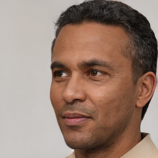 Neutral white adult male with short  black hair and brown eyes