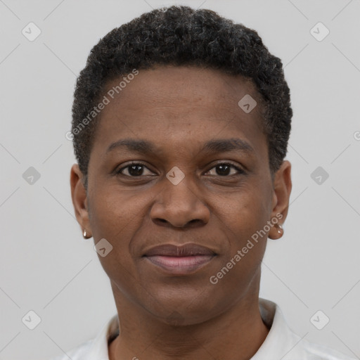 Joyful black young-adult male with short  brown hair and brown eyes