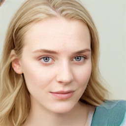 Joyful white young-adult female with long  brown hair and blue eyes