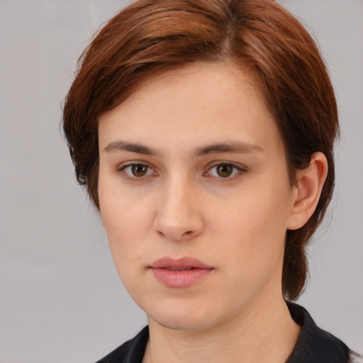 Neutral white young-adult female with medium  brown hair and brown eyes