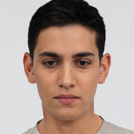 Neutral latino young-adult male with short  black hair and brown eyes