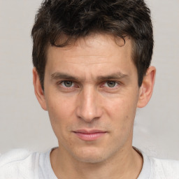 Neutral white adult male with short  brown hair and brown eyes