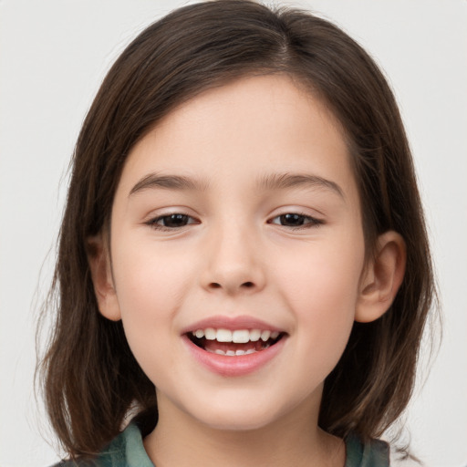 Joyful white child female with medium  brown hair and brown eyes