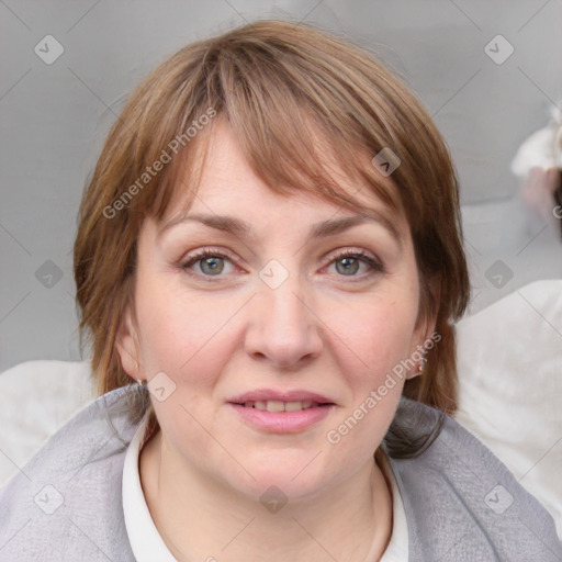 Joyful white young-adult female with medium  brown hair and blue eyes