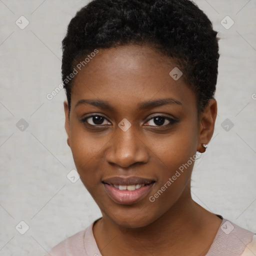 Joyful black young-adult female with short  black hair and brown eyes