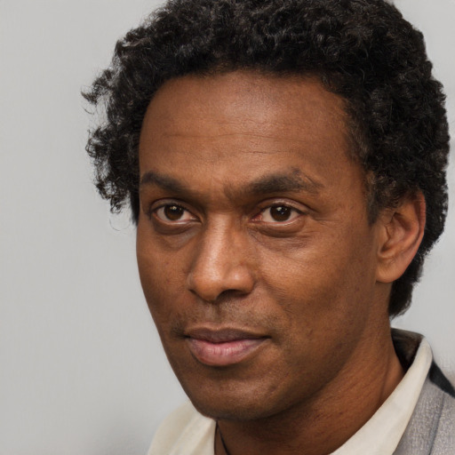 Neutral black adult male with short  brown hair and brown eyes